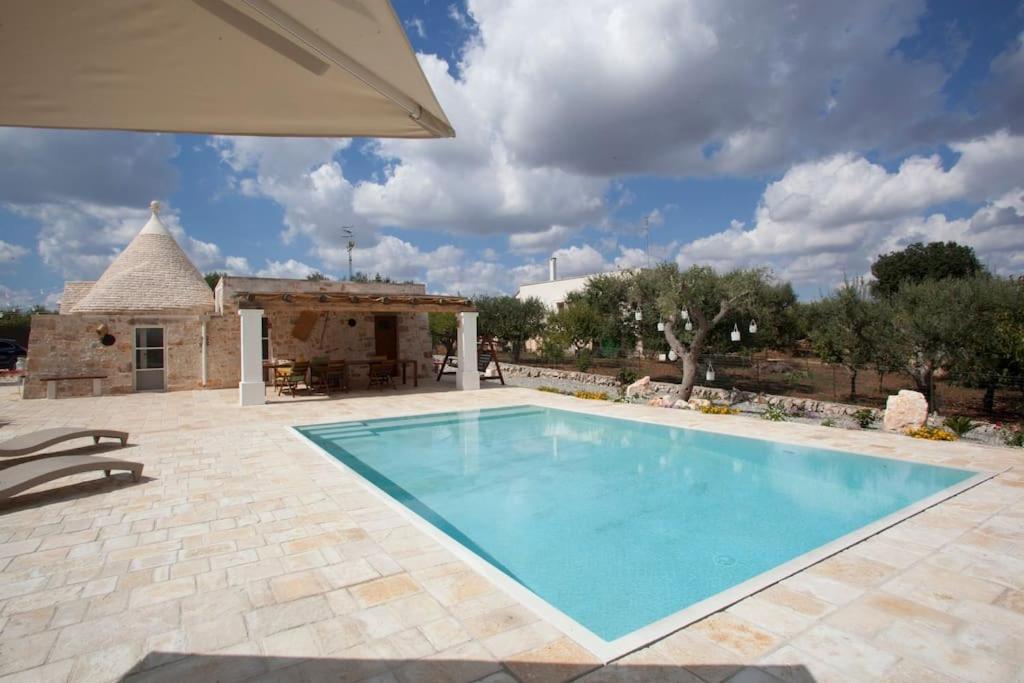 Trullo Oasi Santo Stefano - Private Pool Villa กัสเตลลานา กรอตเต ภายนอก รูปภาพ