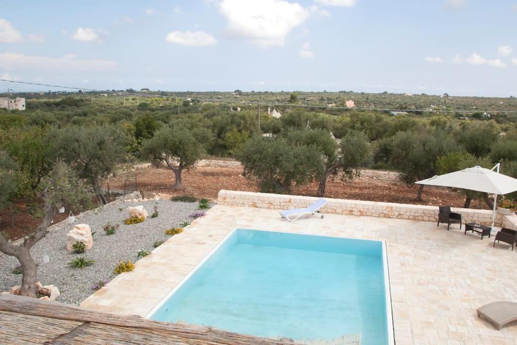 Trullo Oasi Santo Stefano - Private Pool Villa กัสเตลลานา กรอตเต ภายนอก รูปภาพ