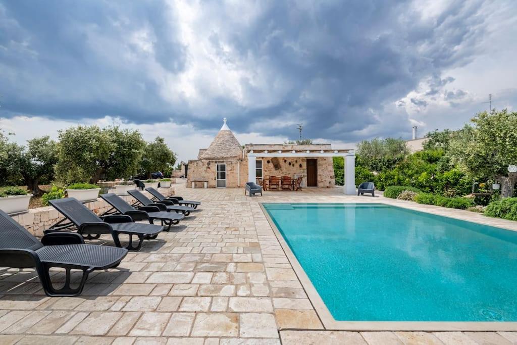 Trullo Oasi Santo Stefano - Private Pool Villa กัสเตลลานา กรอตเต ภายนอก รูปภาพ